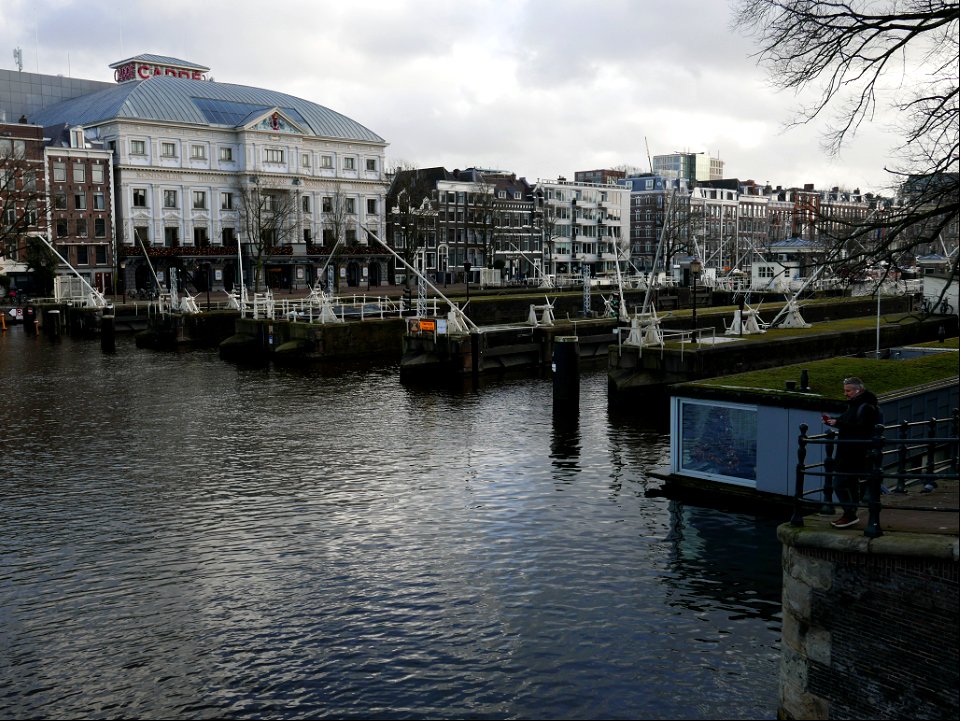The old water locks called Amstelsluizen, in the river Amstel in Amsterdam city; photo 2022.
