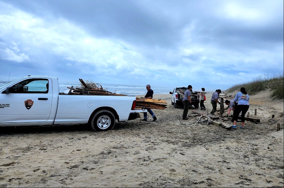 Volunteers with NPS staff at beach cleanup 05-14-2022