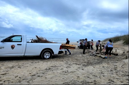 Volunteers with NPS staff at beach cleanup 05-14-2022 photo