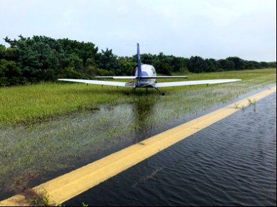 Airplane off runway at Ocracoke Island Airport. No personal injuries or plane damage photo