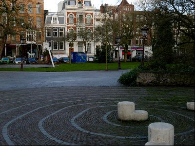 square Frederiksplein with nature and houses, in the city Amsterdam in winter; free urban photo by Fons Heijnsbroek, 2022. photo
