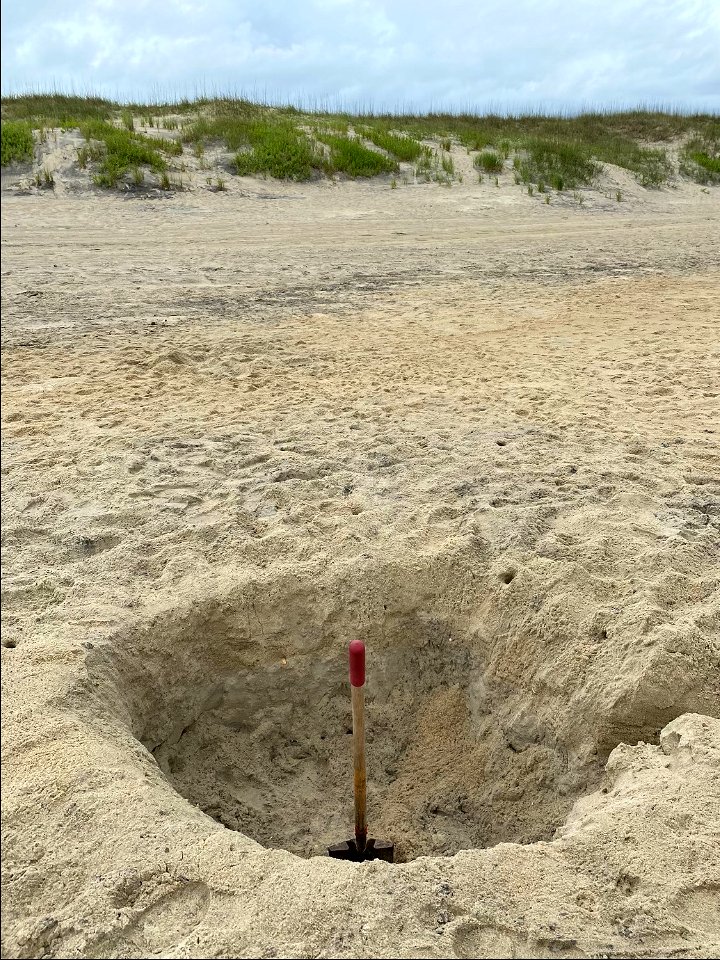 Large hole in beach