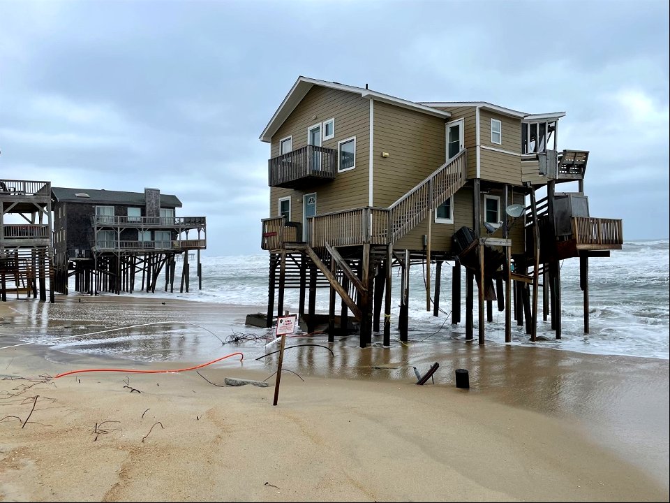 Two houses that collapsed on May 10, 2022 are shown in this photo taken previous day