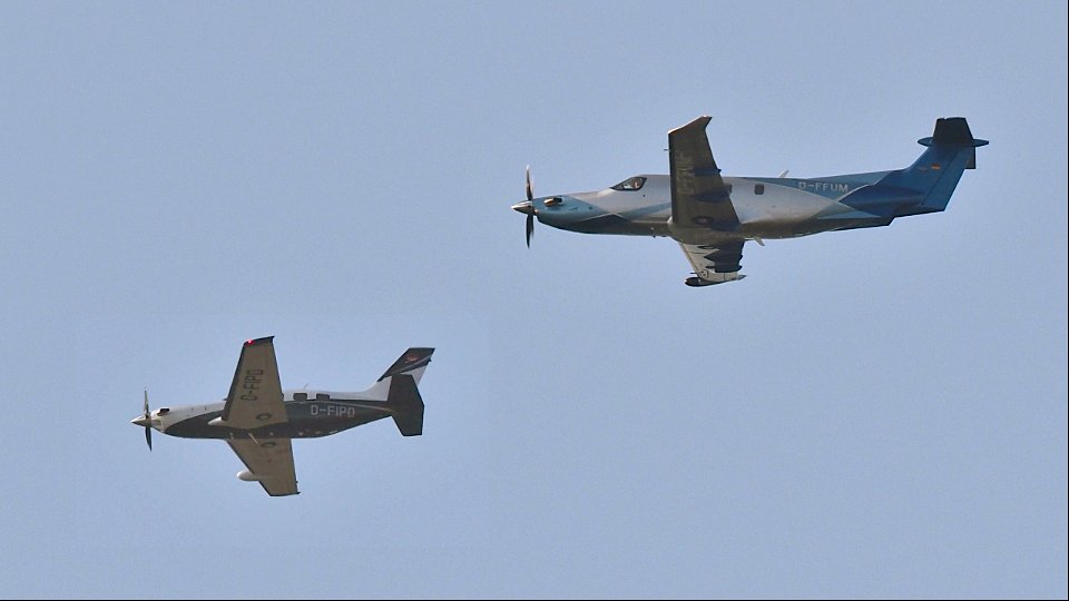 Two single-prop business planes