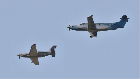Two single-prop business planes