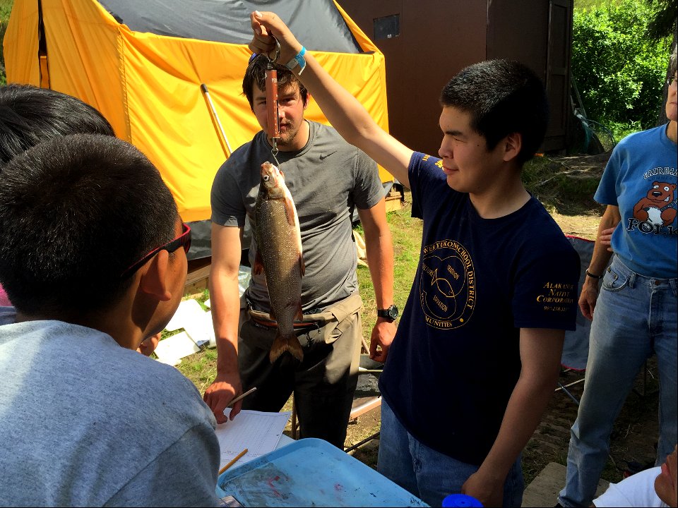 Isaiah weighs whitefish
