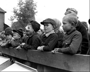 SC 405033 - Russian children watch the May Day celebration at the displaced persons camp at Hamm, Germany. photo