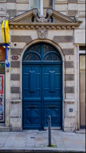 La porte au mascaron de l'immeuble Herbin-Vivien