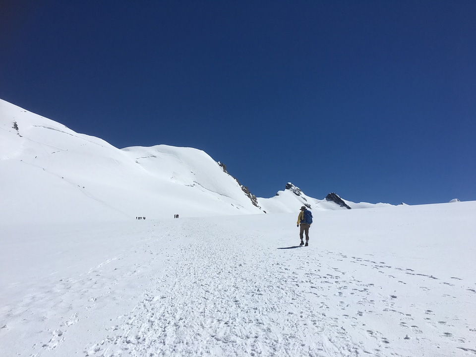 hikers team in the mountains. Matterhorn. Swiss Alps