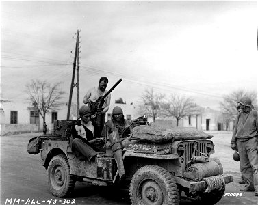 SC 170096 - L-R: Pfc. Philip L. Mahoney, driver, and T/5 R. R. Pollard, rear seat, were trapped for three days by the Germans.
