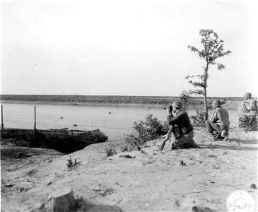 SC 270874 - Three members of HQ, 2nd Bn., 85th Regt., 10th Mtn. Div., arrived at the Po River bank for reconnaissance. photo