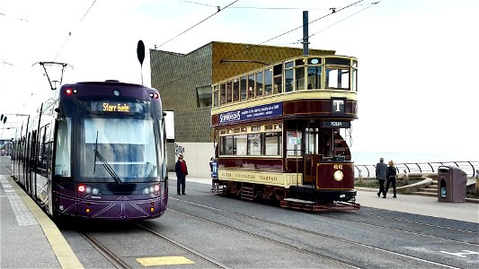 Oldest and newest trams operating in Blackpool photo