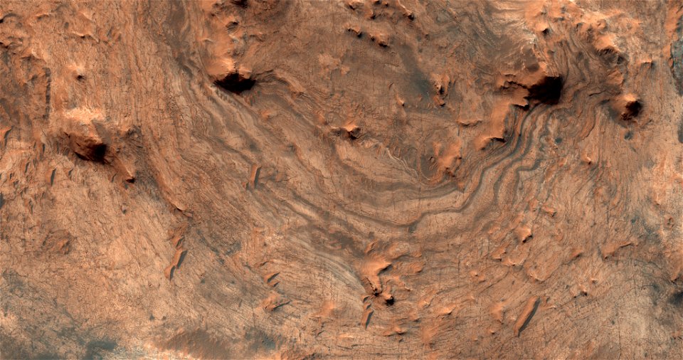 Light-Toned Layered Rocks in the Arabia and East Xanthe Regions