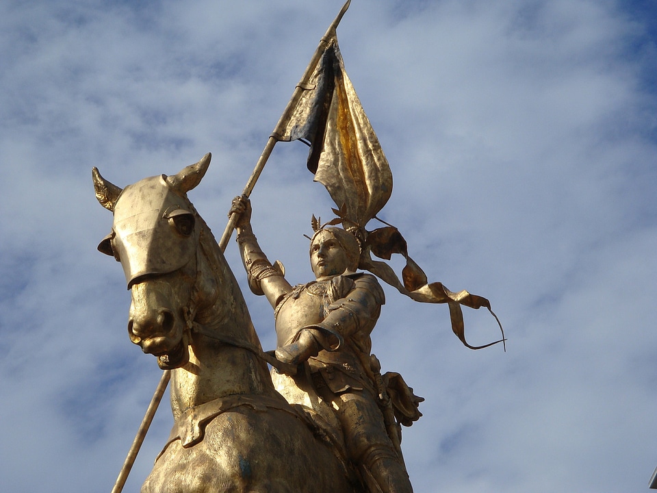 Golden statue of Joan of Arc on horseback in Paris