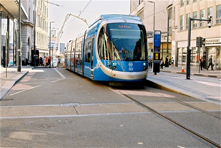 West Midlands Metro tram No. 33 stands at Bull Street where it has terminated due to construction works beyond this point.