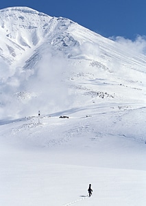 Man skiing on slope photo