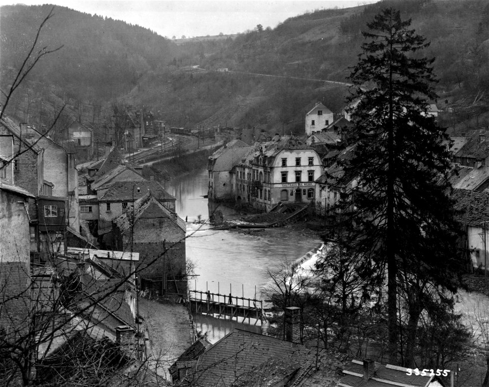 SC 335255 - The rail station and bridge spanning the Kyll River, Kyllburg, Germany, was destroyed during the advance of the U.S. Third Army on the town. 6 March, 1945.