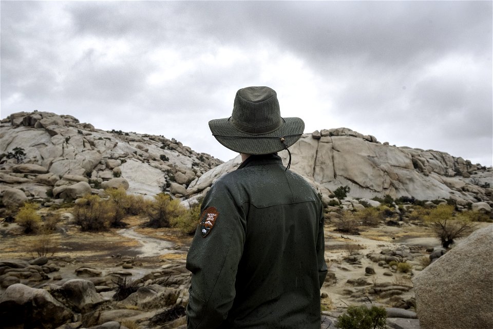 Park ranger in the rain at Barker Dam