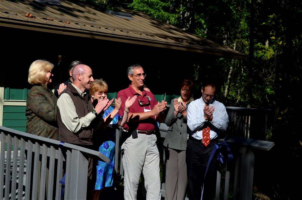 Following the ribbon cutting, conservation partners celebrate the opening of the Bob Hines Refuge Ranger Station.