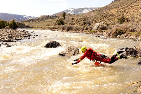 Swiftwater rescue training: swimmer in the water