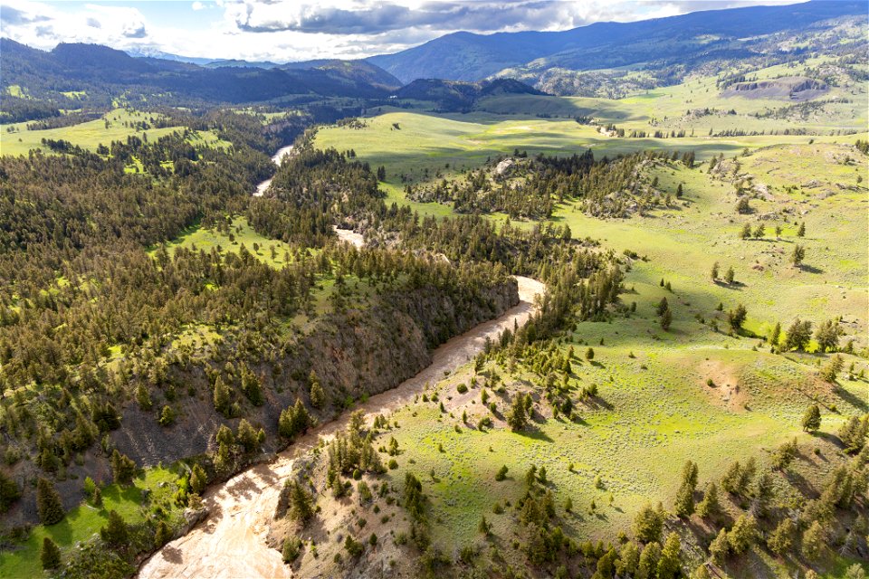 Yellowstone flood event 2022: Swollen Yellowstone River above the Hellroaring Bridge