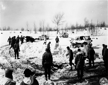 SC 364471 - T-15 towing 105mm mounted on newly-designed gun-ski. 11 March, 1943.