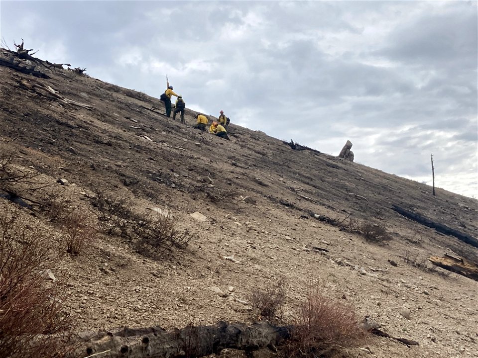 BAER scientist on steep slopes above the waterline road