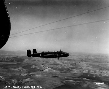 SC 170049 - A B-25 bomber on one of its missions. Berteaux, North Africa. 10 February, 1943. photo