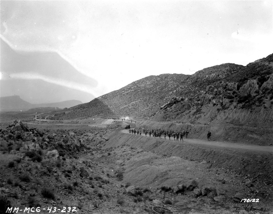 SC 170122 - Infantry marching through Tunisia.
