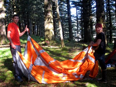 The boys set up their tent.