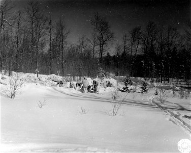 SC 364481 - Co. B, 23rd Inf. Regt. "digging in" machine gun emplacement during tactical problem in Camp James Lake, Mich. area. photo