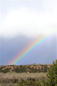Rainbow over the hills of the Karl E. Mundt National Wildlife Refuge photo