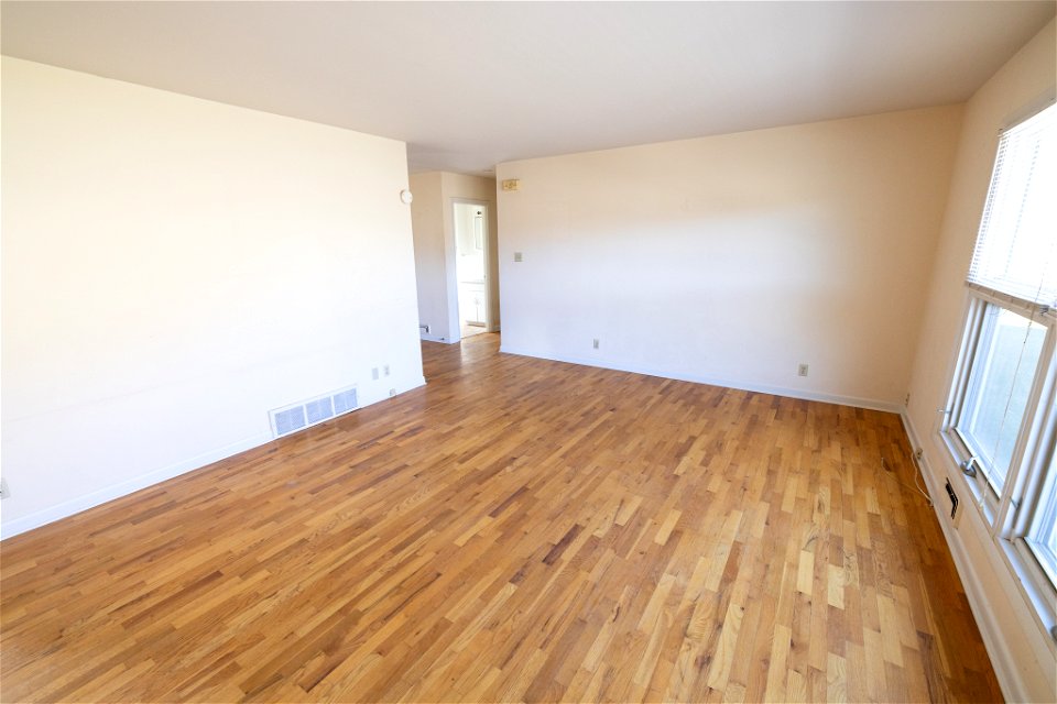 Employee housing Improvement Project Goal 2: living room before