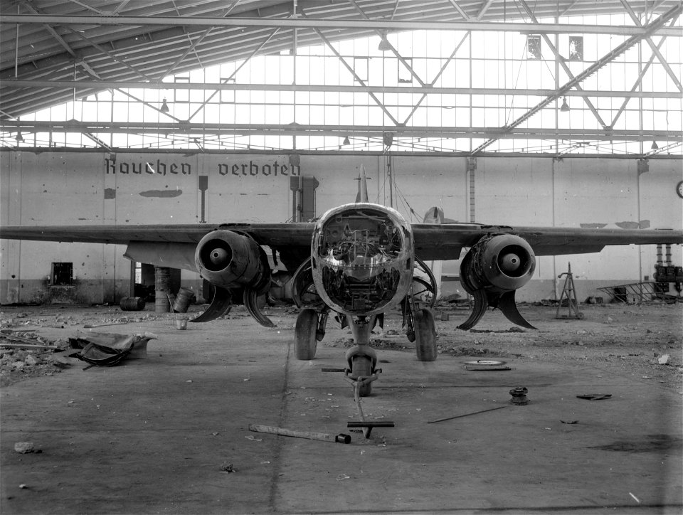 SC 196209 - This German twin-engined, jet propelled fighter plane was abandoned by Luftwaffe troops in hanger of German airfield captured by 111 Corps, 3rd U.S. Army, at Manching, Germany.