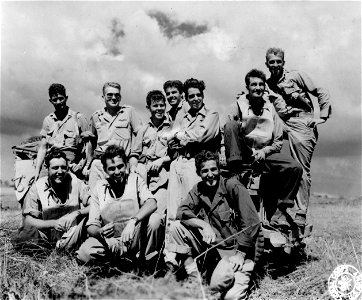 SC 335384 - Members of the 36th Fighter Sqdn at Hill Fighter Strip near Sa Jose, Mindoro Island, who were the first fighter squadron to land on the strip after encountering a group of Jap zeroes and shooting down four. photo
