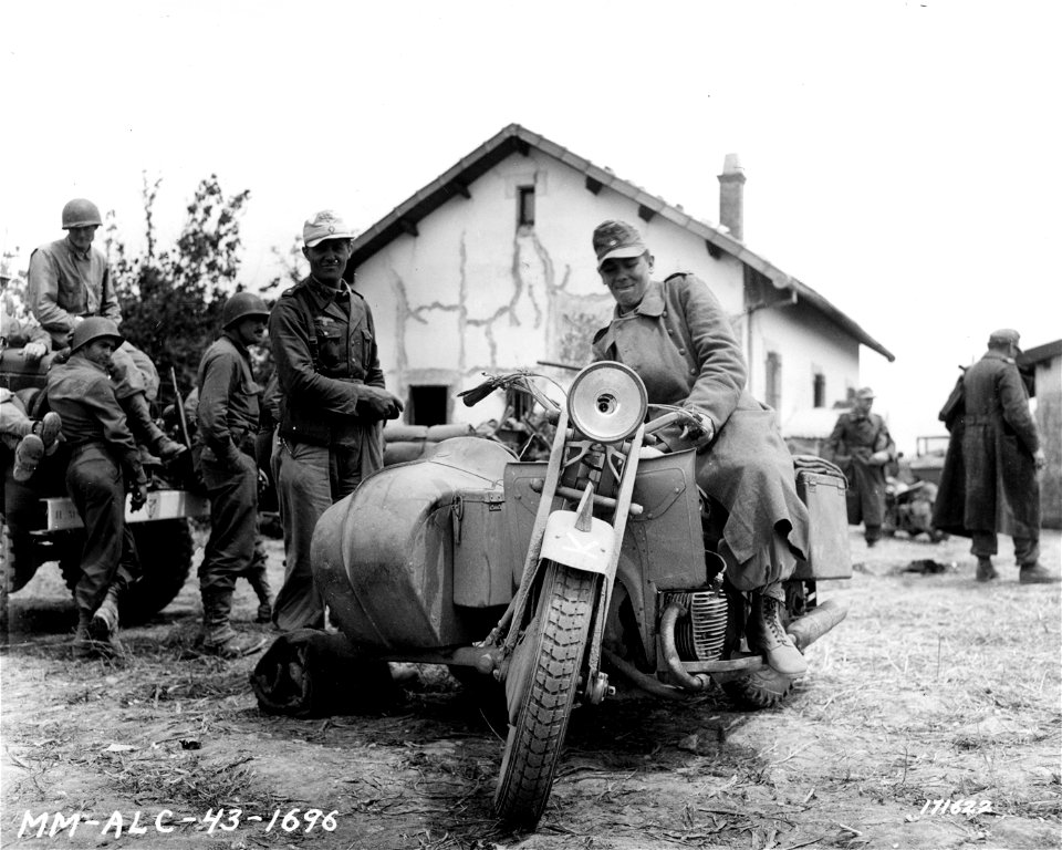 SC 171622 - German prisoners, captured after the Allied Armies had crushed the power of the Axis in the whole of North Africa, arrive at one of the many stockades in Tunisia, by means of their own transportation. 9 March, 1943.