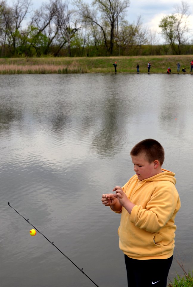 Prepping the worm for fishing