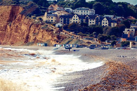 Budleigh Salterton is a seaside town on the coast in East Devon, England, 15 miles (24 km) south-east of Exeter. It lies within the East Devon Area of Outstanding Natural Beauty