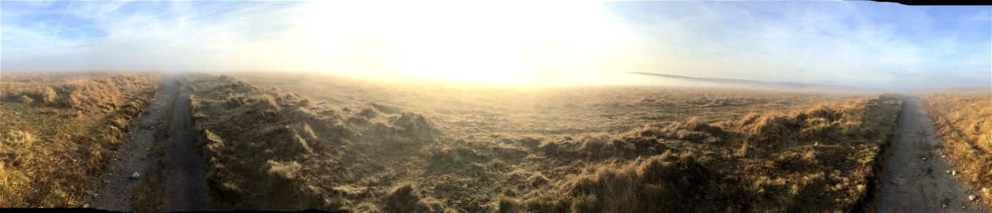 Sunrise, Rolling Mist, Evil Combe, Dartmoor National Park, Devon, UK. 17th April 2022 (Apple Ipod Panoramic Photo)