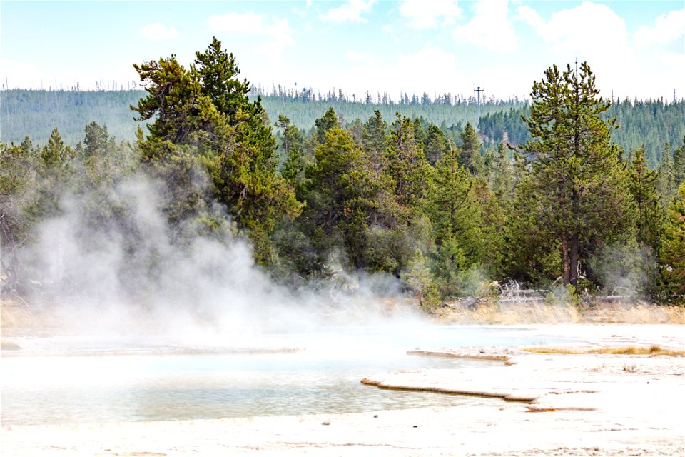 Communications tower at Old Faithful over Three Sisters Springs