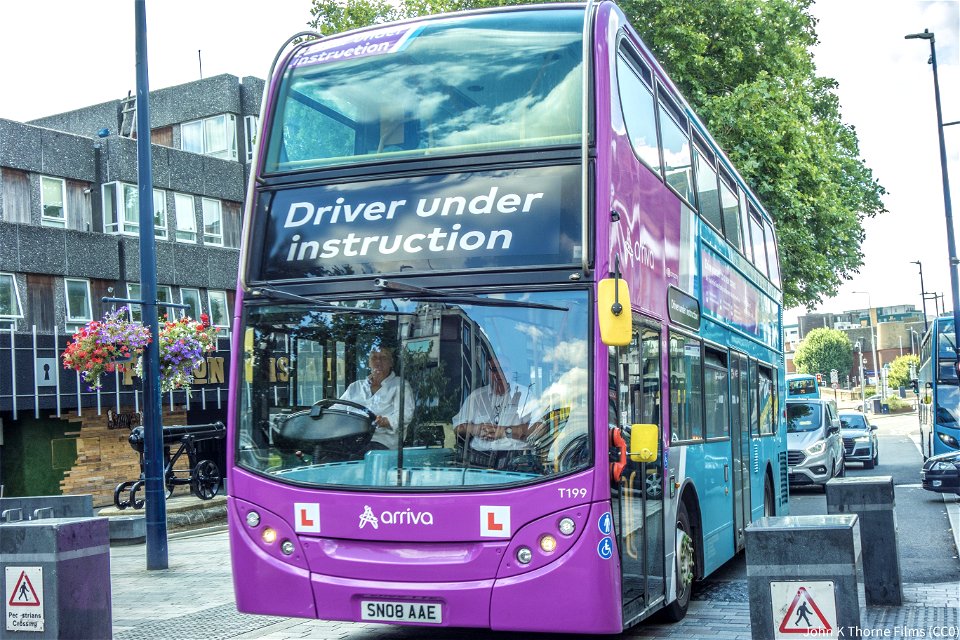 SN08AAE Arriva (Driver under instruction bus)