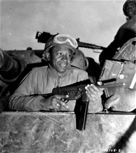SC 196108-S - Sgt. Harvey Woodward, Howard, Ga., is a commander of an M-4 tank, somewhere in France.