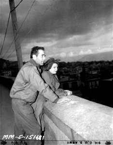 SC 184714 - Humphrey Bogart, actor, and his wife, Mayo Methot Bogart, while at Naples, Italy, during a 12-week entertainment tour. 20 December, 1943.