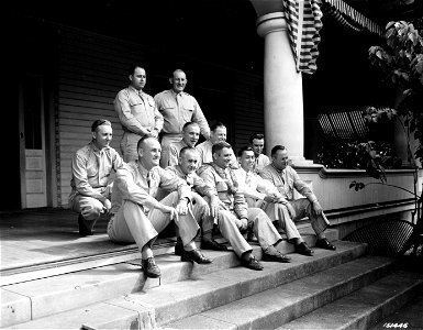 SC 141446 - Seated at the party for Col. Nave are left to right Col. Roosma, M/Sgt. Hickman, Col. Nave, Mr. Clarence Chun Hoon, and Sgt Robert A. Thomason. photo