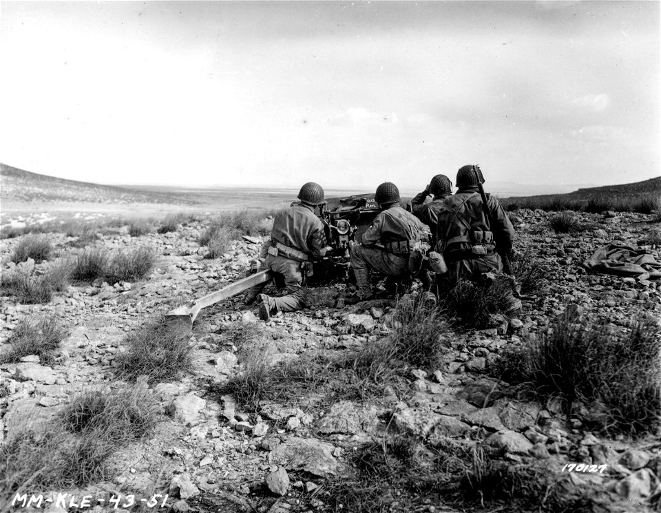 SC 170127 - American crew and anti-tank gun set up to cover enemy tank approach.