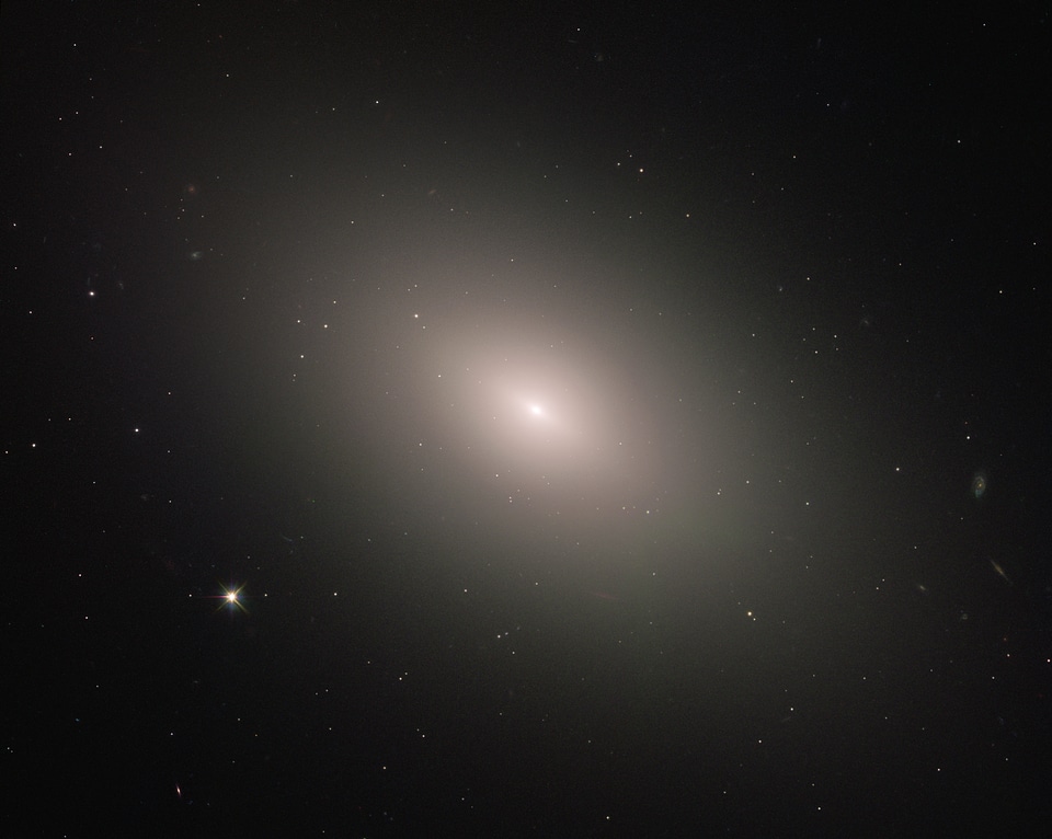 This luminous orb is the galaxy NGC 4621