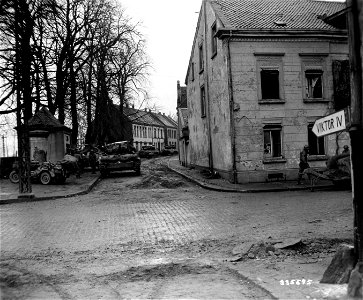 SC 335575 - American tank destroyers of the 8th Armored Division of the Ninth U.S. Army line a street of Rheinberg, Germany. 6 March, 1945. photo