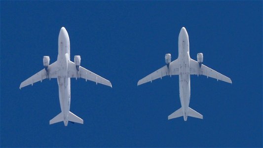 Two Lufthansa Airbus A319-114 in Star Alliance Livery departing from Munich: