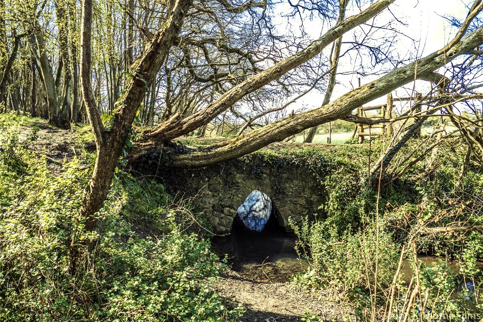 Little Medieval Footbridge Single Span over ancient stream.
