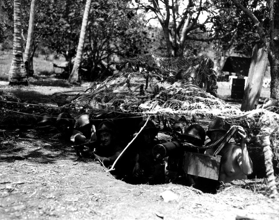SC 170655 - .30 caliber machine gun emplacement and crew used by a battalion for protection, somewhere in New Guinea.